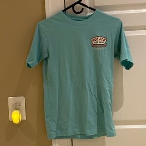 Ron Jon Distressed Cocoa Beach FL Trusty Badge Unisex Tee in Sea Foam Green